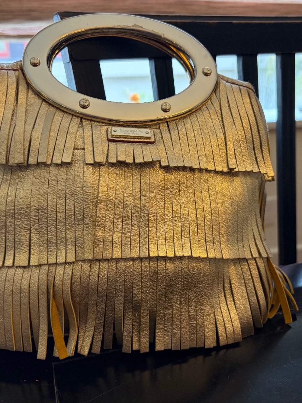Kate Spade purse in gold fringe, top handle